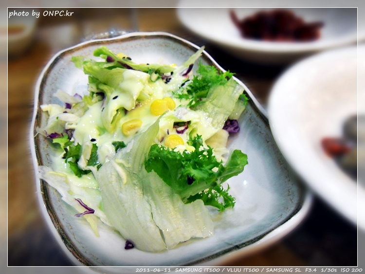 매콤한 왕갈비와 해물의 조화 - 성안동 아낙촌